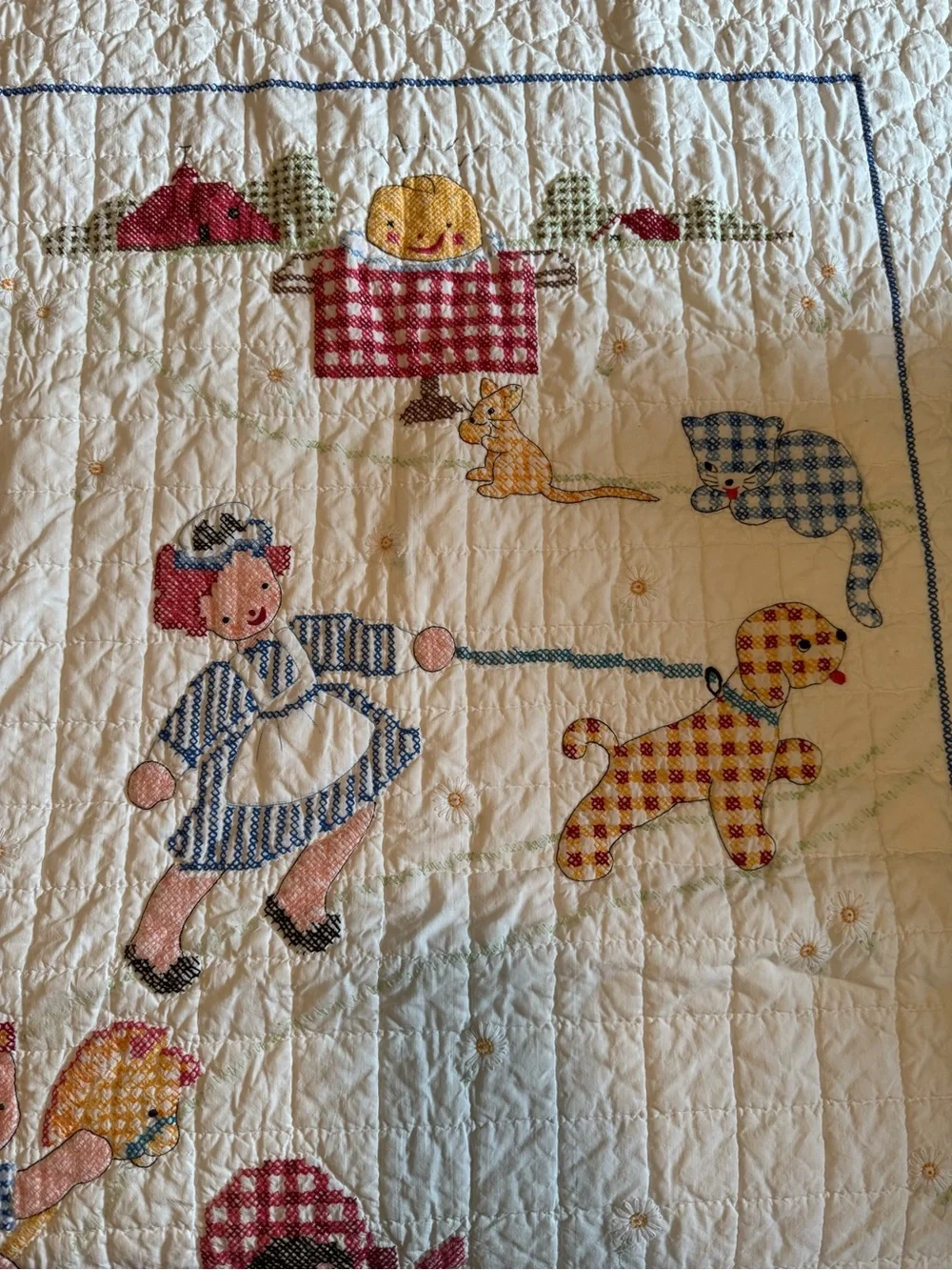 Vintage embroidered kids quilt